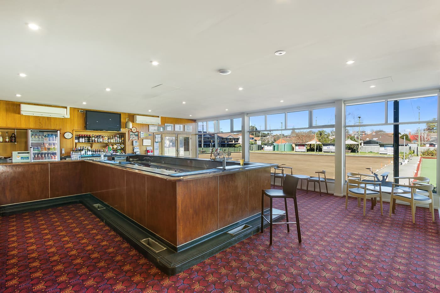 Auburn's horseshoe bar looking out over the greens